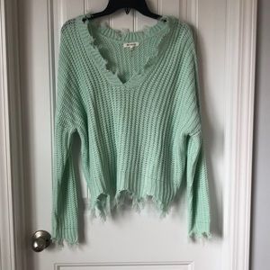 Distressed sweater